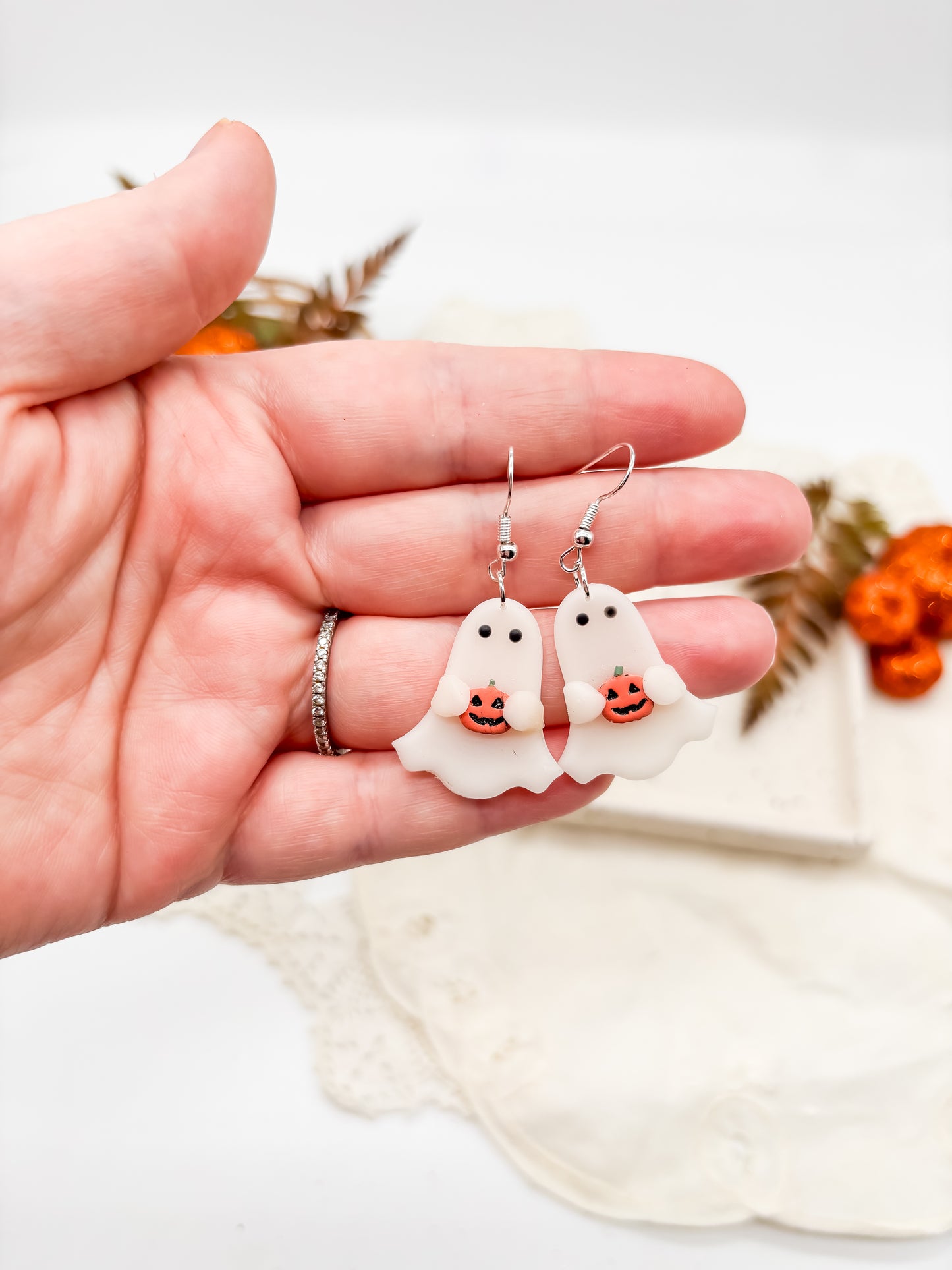 Ghostie holding jack-o-lantern
