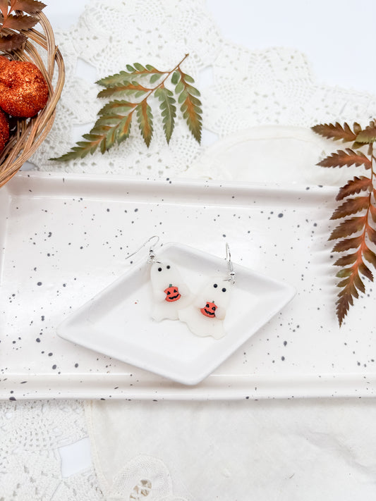 Ghostie holding jack-o-lantern