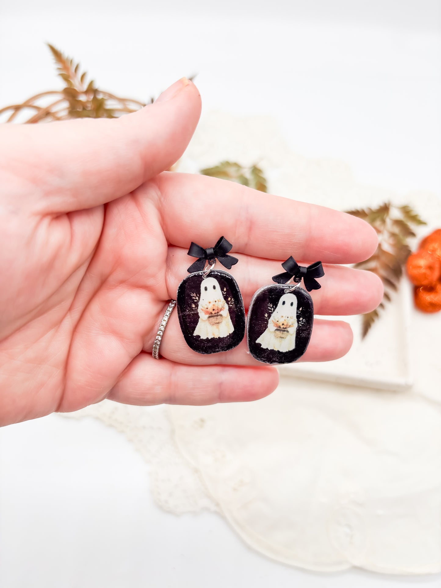 Vintage boho ghosties holding baskets of flowers