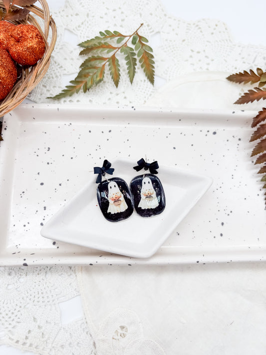 Vintage boho ghosties holding baskets of flowers