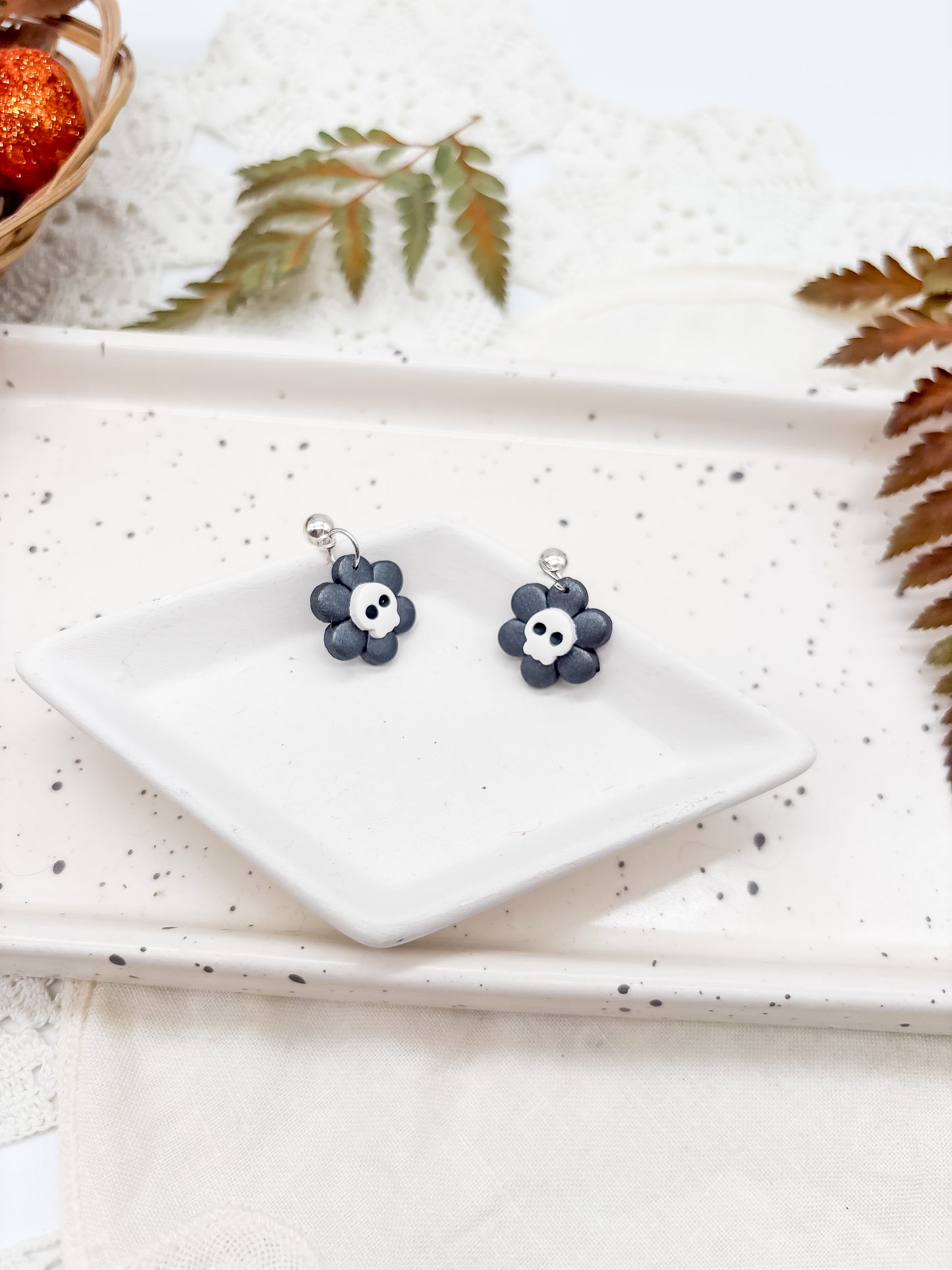 Skull flower earrings in studs and dangles