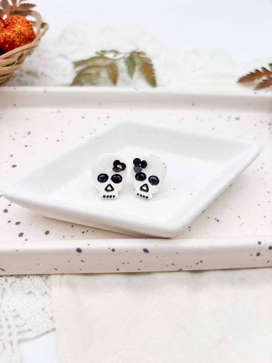 White skull studs