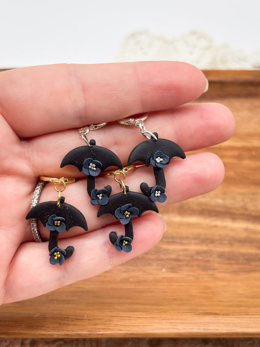 Black umbrella dangles
