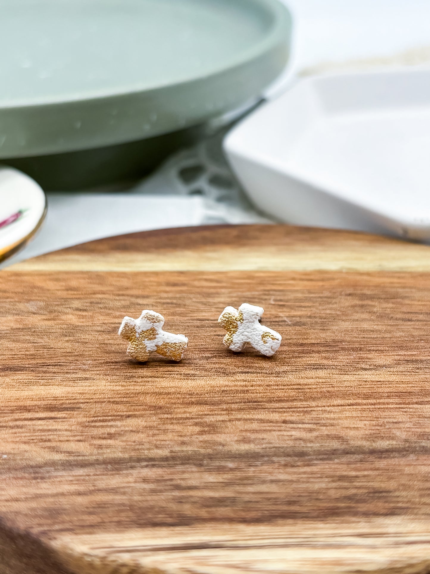 Small gold and white cross stud earrings