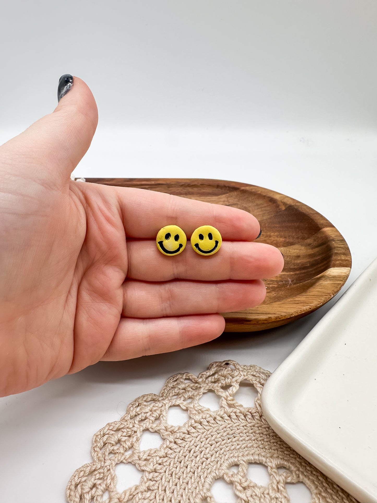 Happy face studs in multiple colors