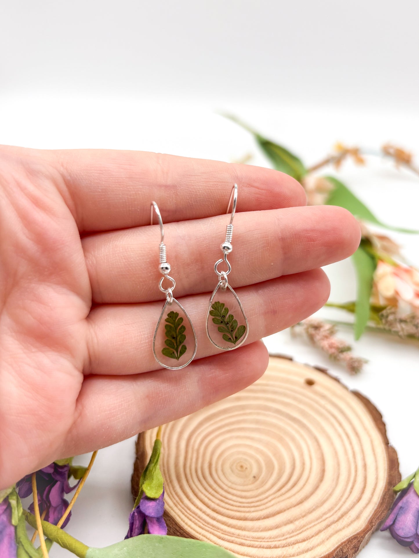 Small teardrop dangles with ferns in gold or silver