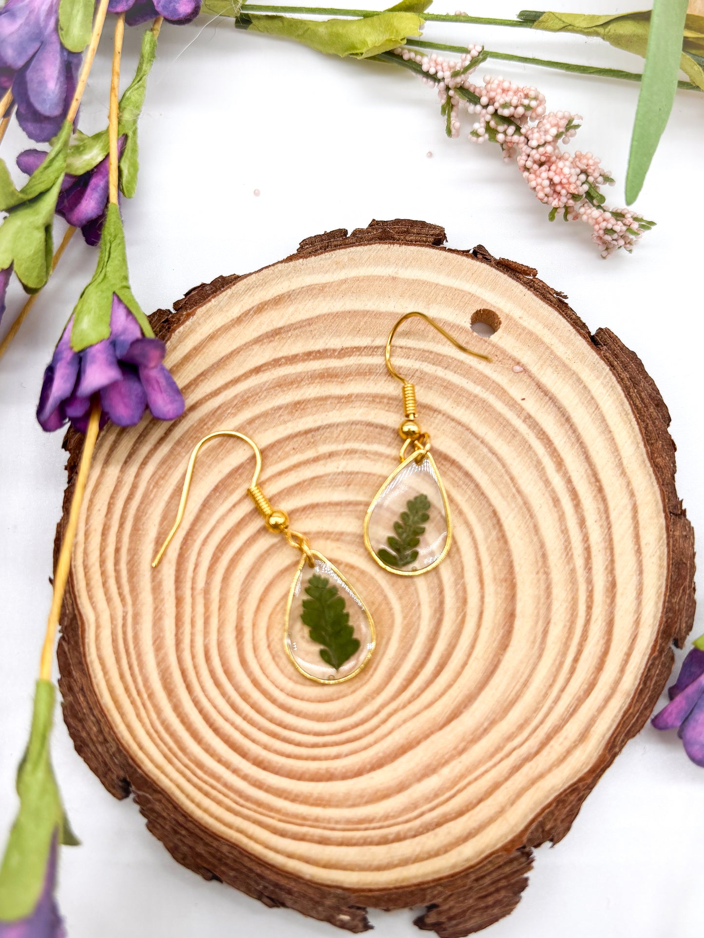 Small teardrop dangles with ferns in gold or silver