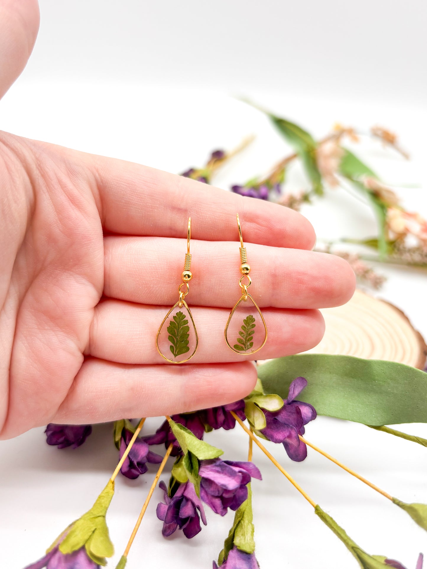 Small teardrop dangles with ferns in gold or silver