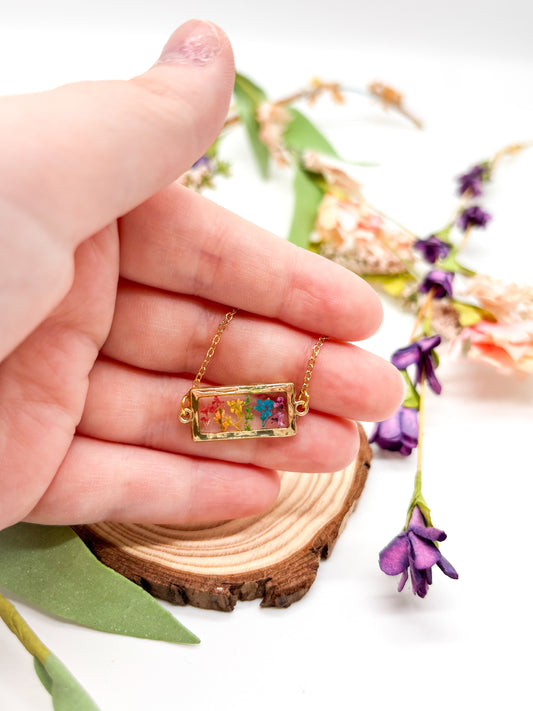 Gold plated rainbow flowers horizontal bar necklace