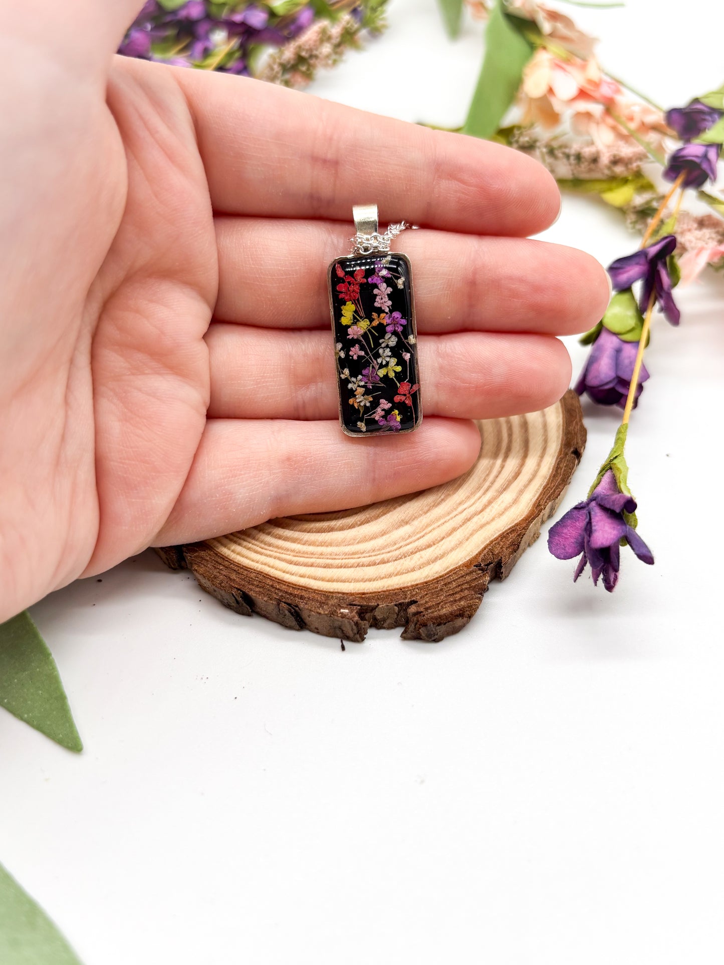 Silver plated necklace with multi color flower pendant