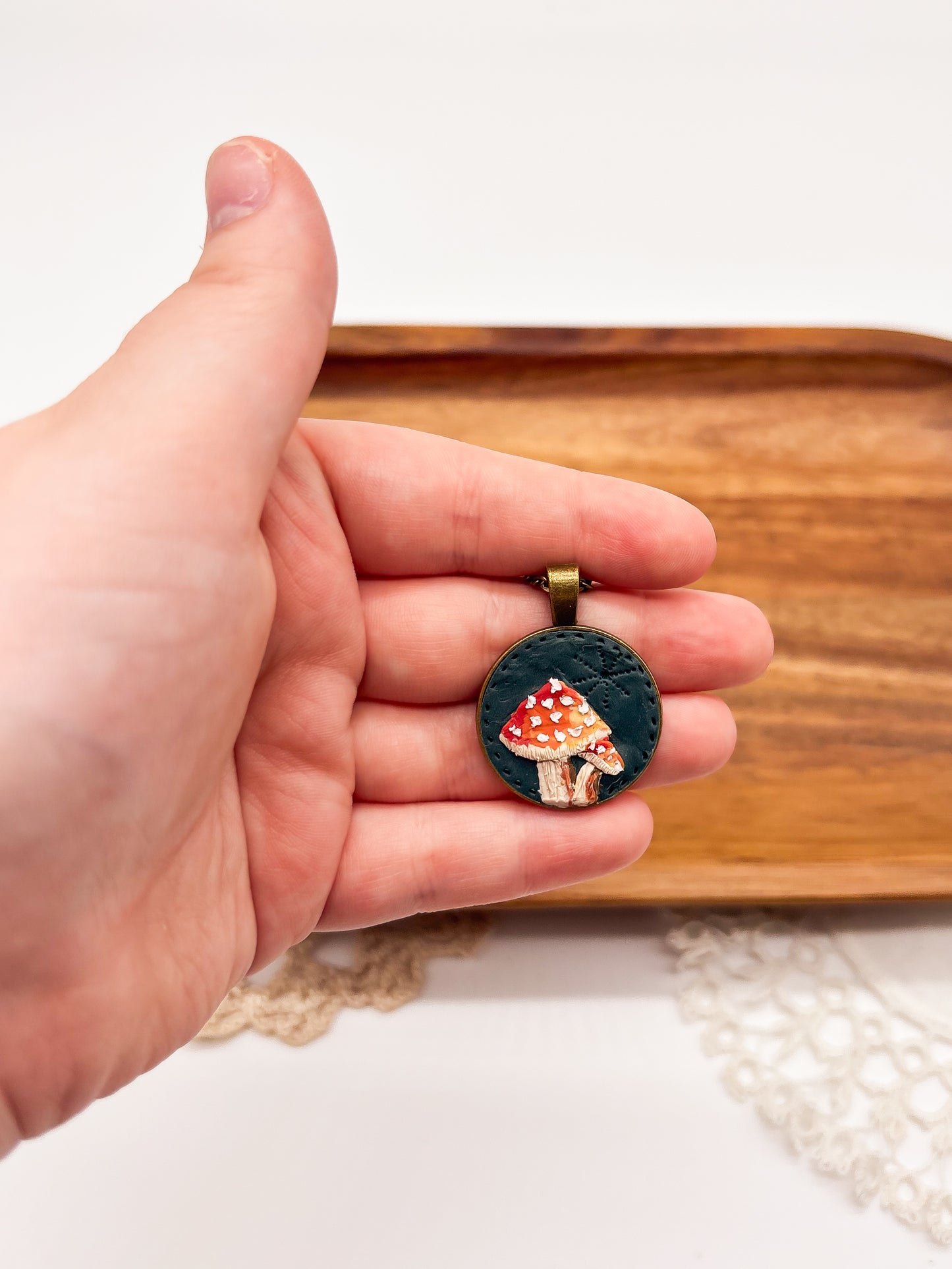 Mushroom necklace on dark background