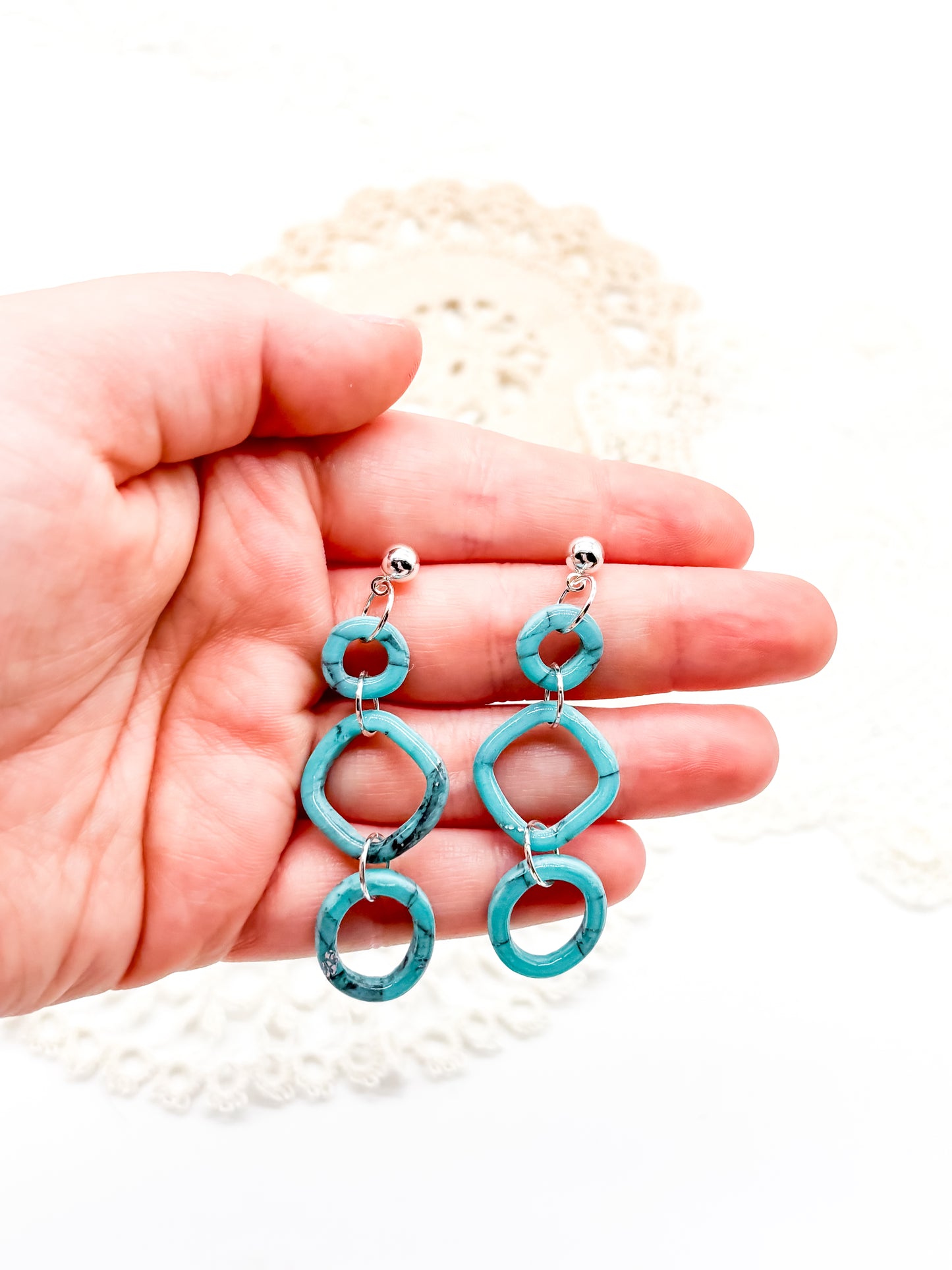 Turquoise dangle in organic outline
