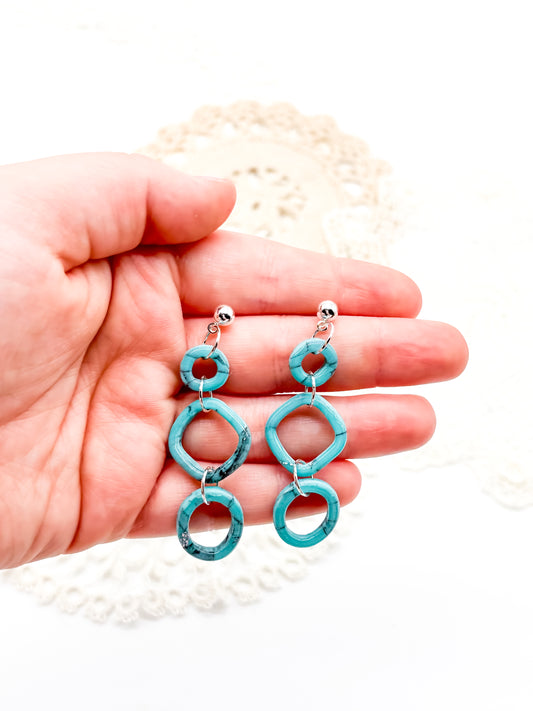 Turquoise dangle in organic outline