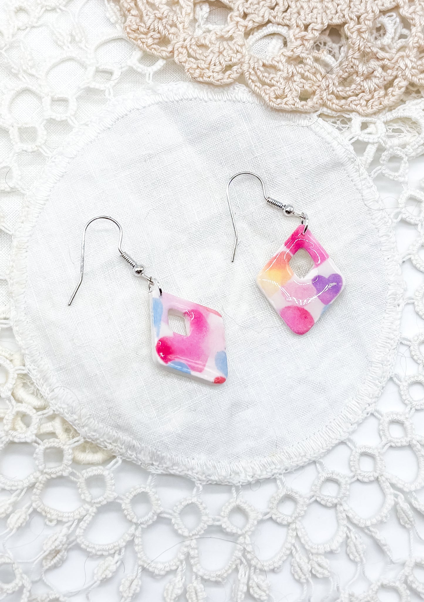 Pastel rainbow heart in diamond shape