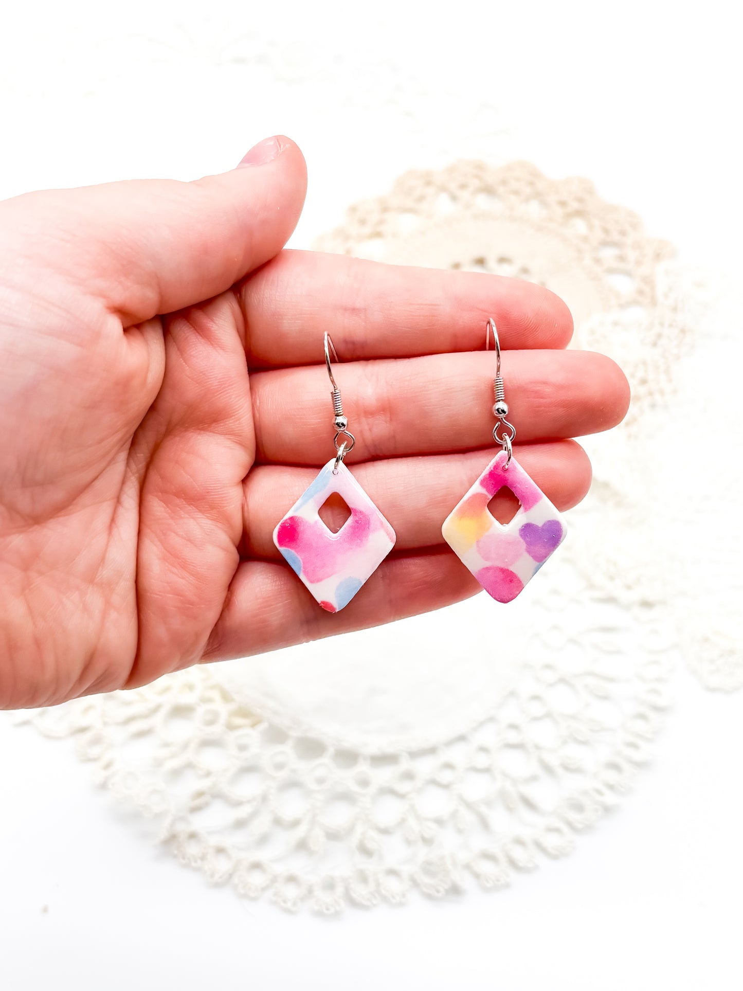 Pastel rainbow heart in diamond shape