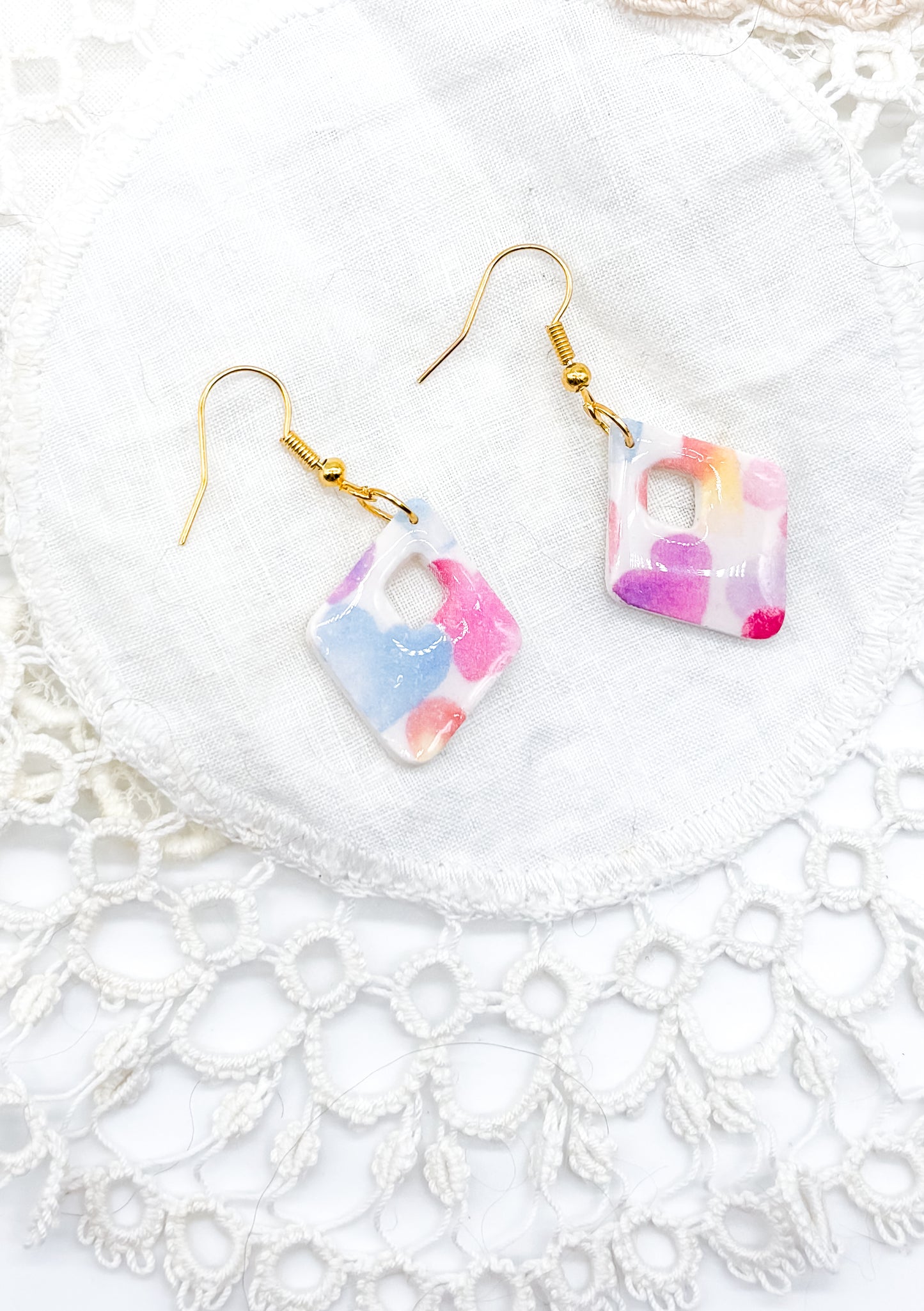 Pastel rainbow heart in diamond shape