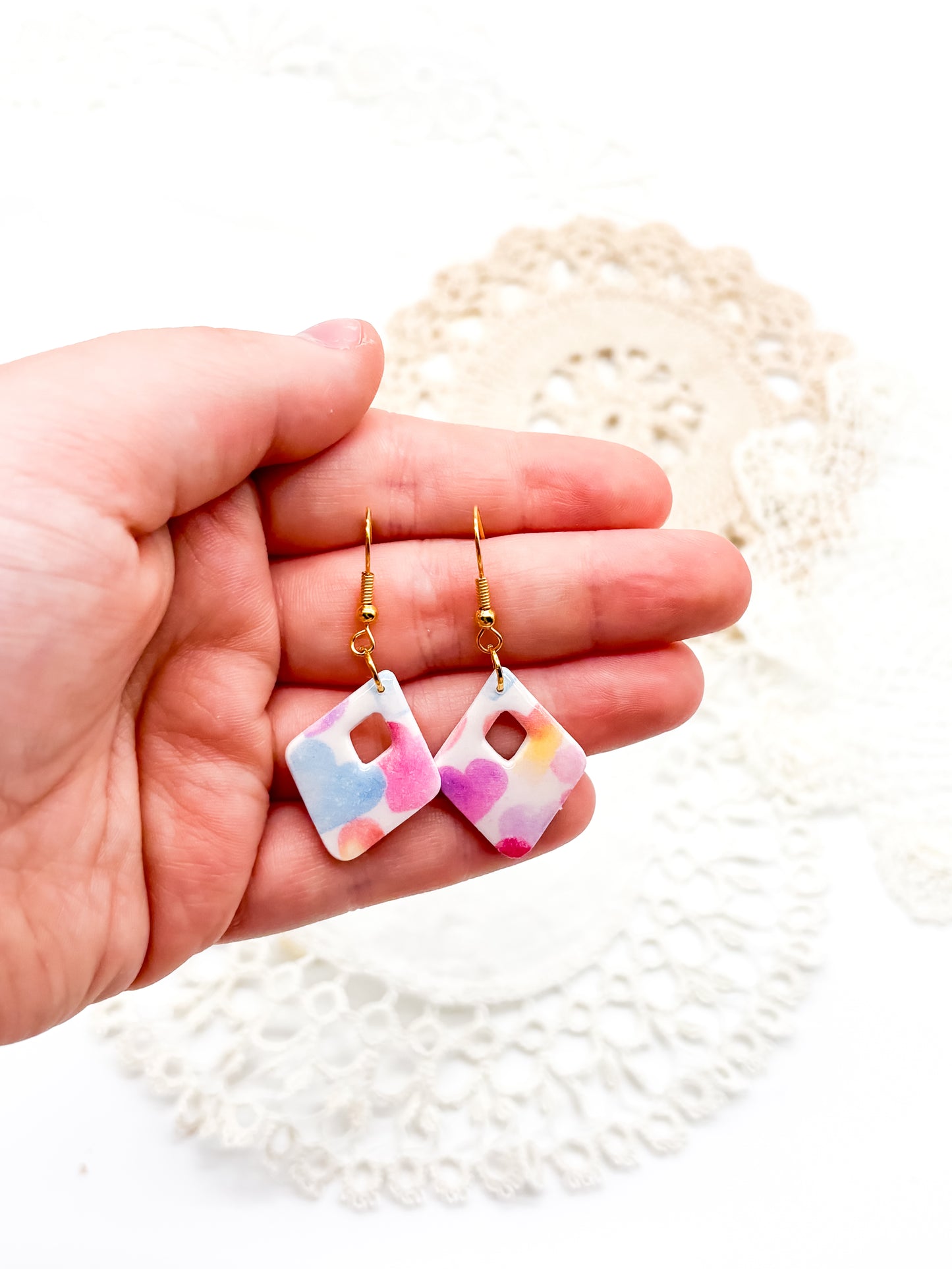 Pastel rainbow heart in diamond shape
