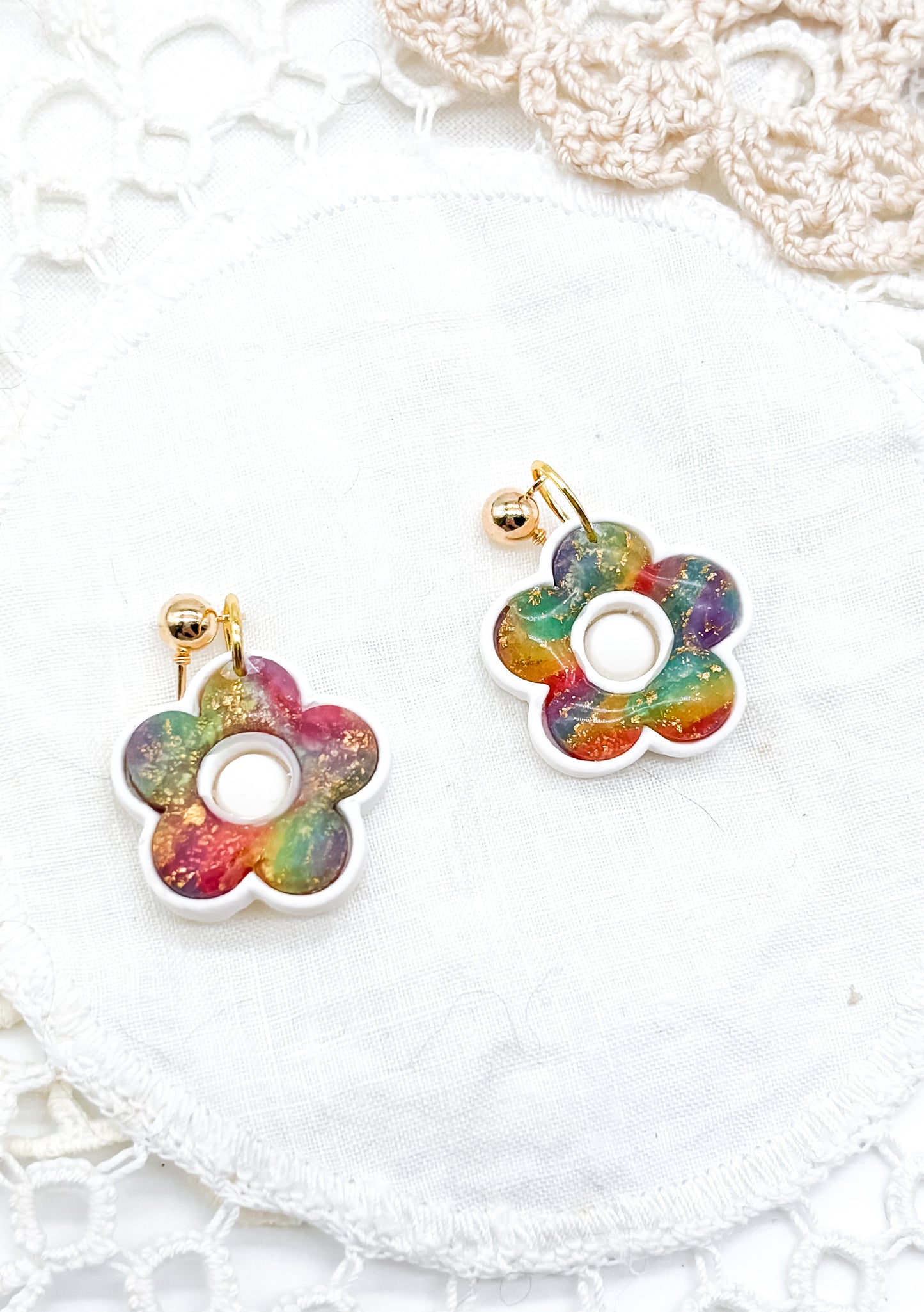 Rainbow flower bezel dangles