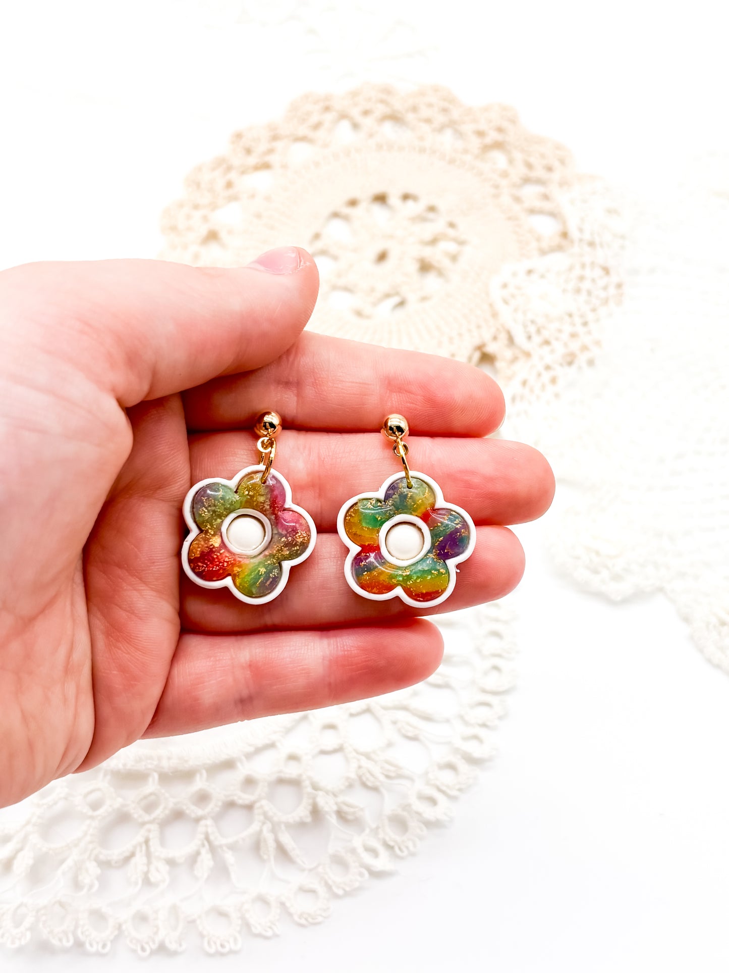 Rainbow flower bezel dangles