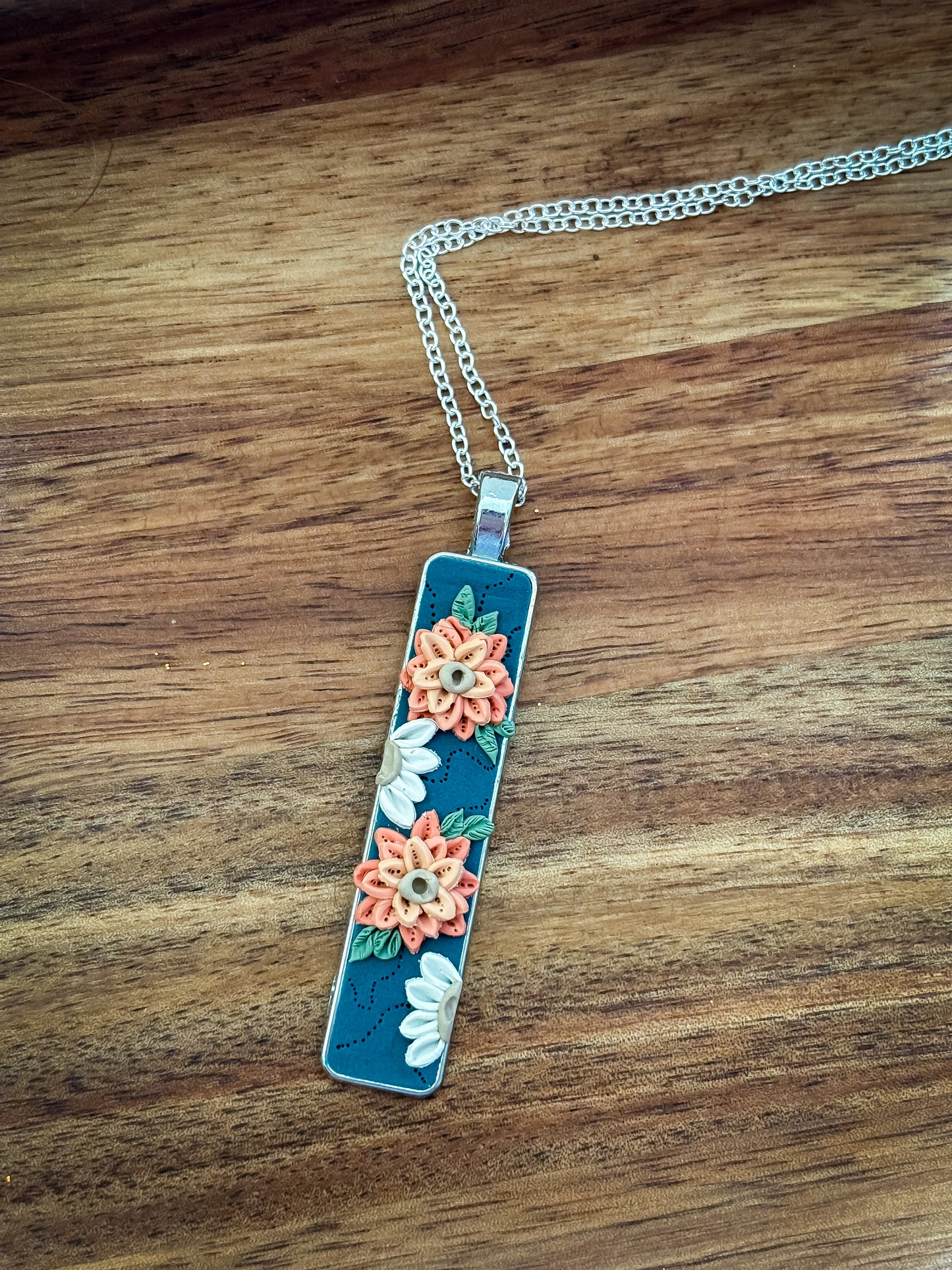 Silver rectangle necklace with peach flower