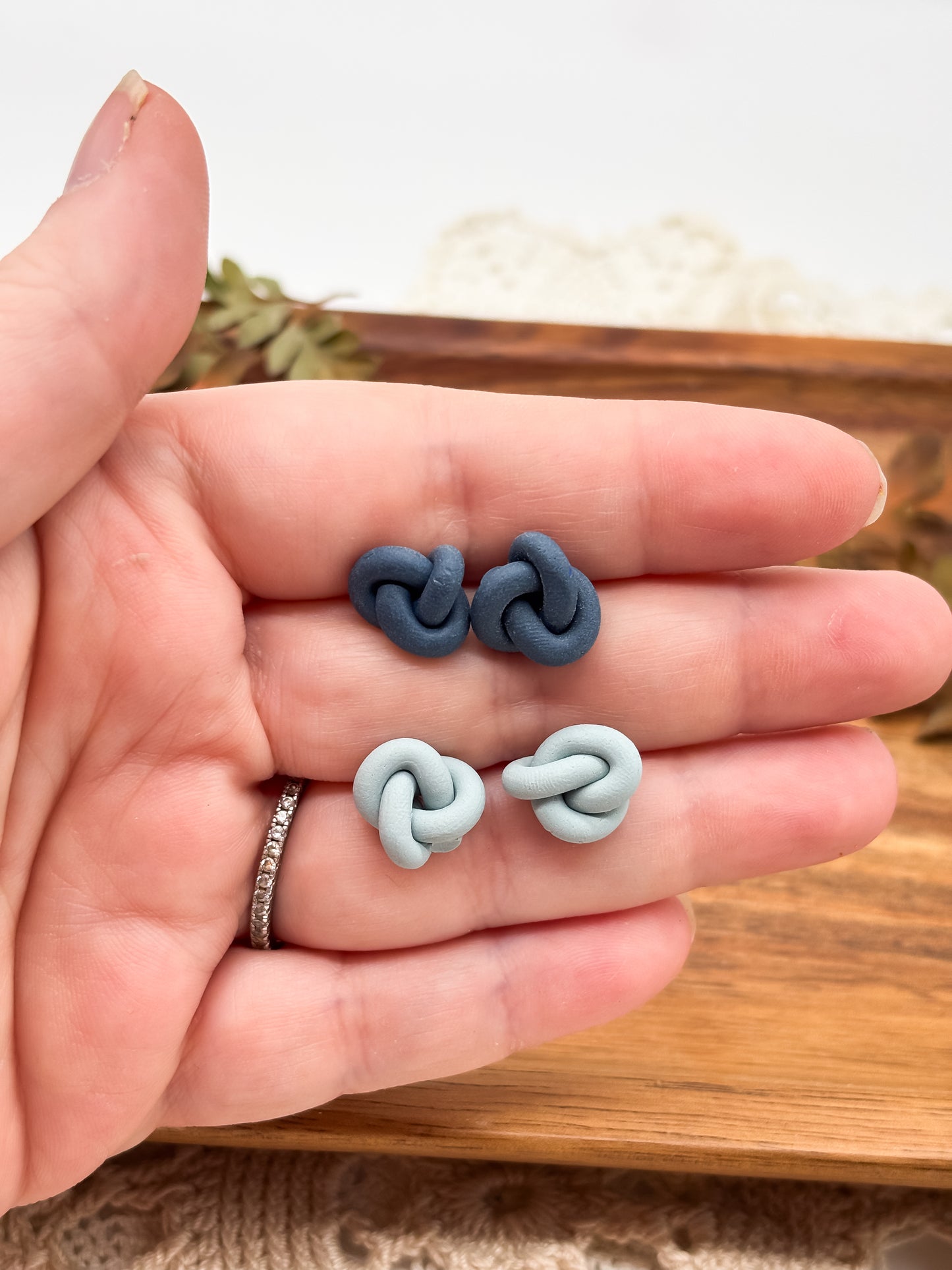Blue knot studs in 2 color options