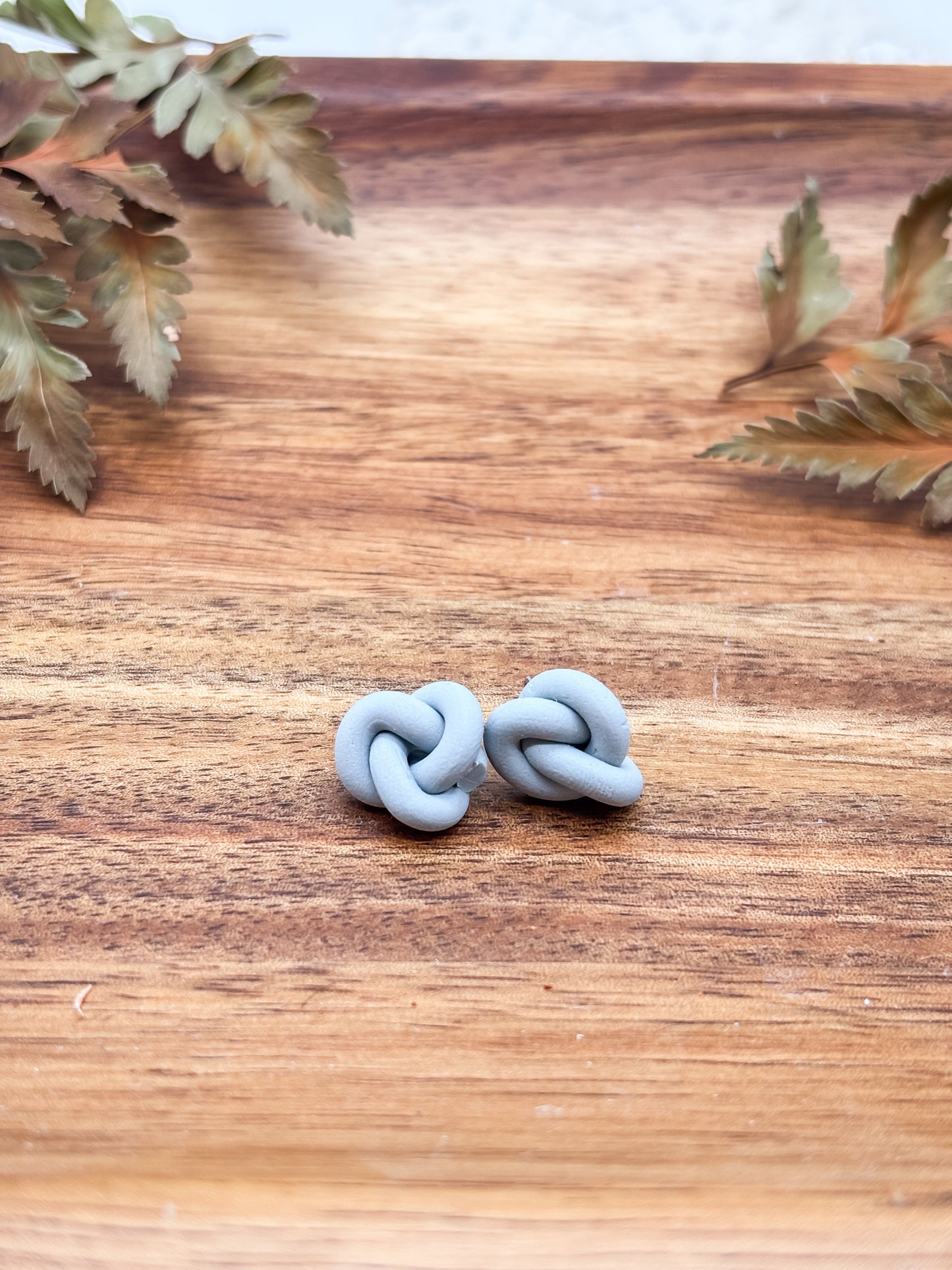 Blue knot studs in 2 color options