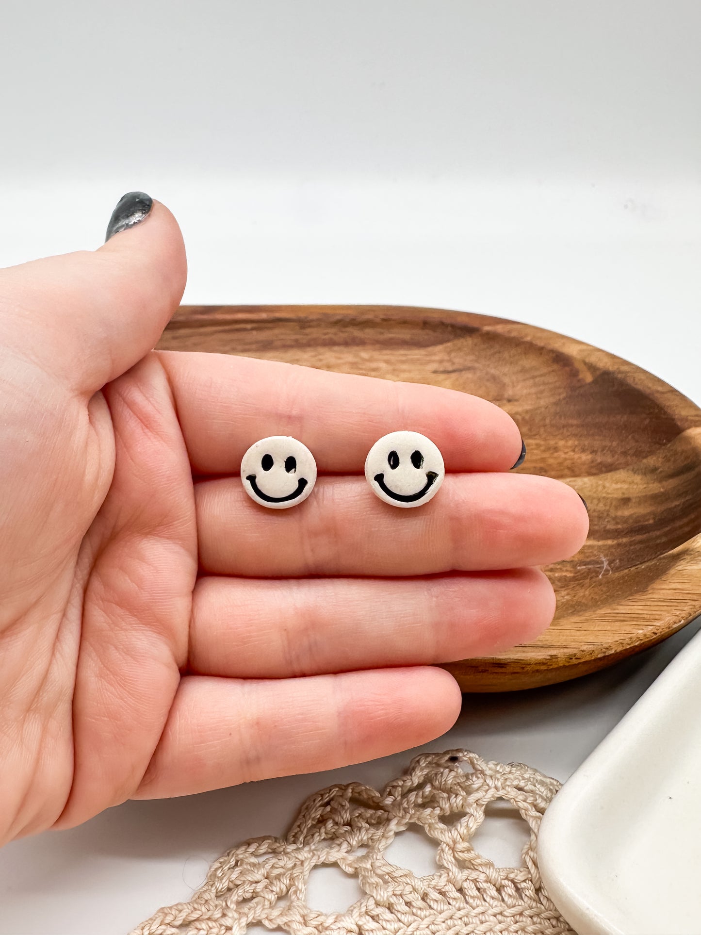 Happy face studs in multiple colors