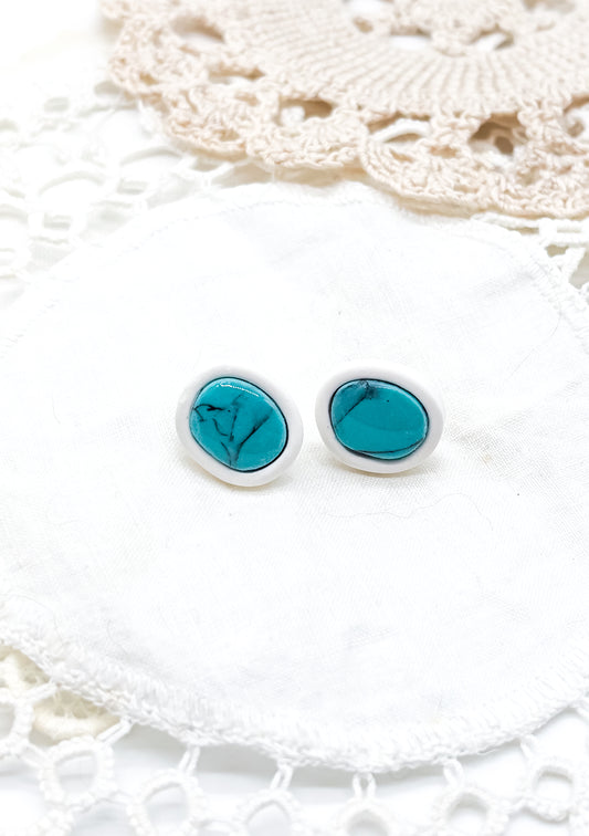 Turquoise studs in white clay bezel